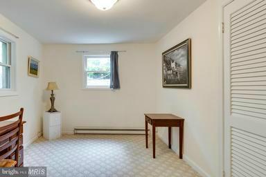 6609 Robin Road Springfield, VA 22150 - Photo 22 of 28 a view of room with window and furniture