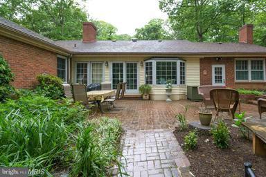 6609 Robin Road Springfield, VA 22150 - Photo 24 of 28 a house view with a seating space and garden