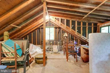 6609 Robin Road Springfield, VA 22150 - Photo 26 of 28 a roof deck with table and chairs