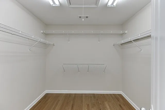 a view of an empty walk in closet