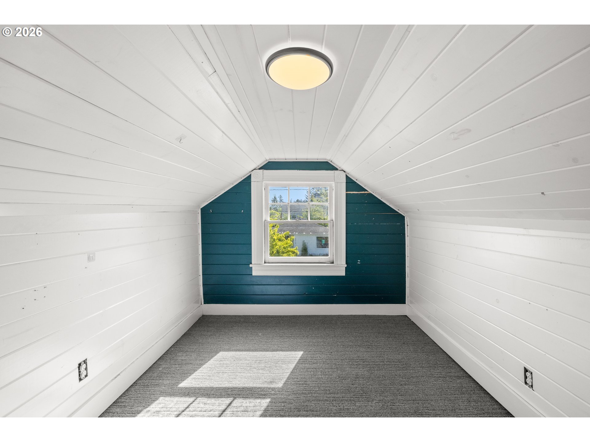 3909 Southeast 69th Avenue Portland, OR 97206 - Photo 11 of 15 a view of an empty room with a window