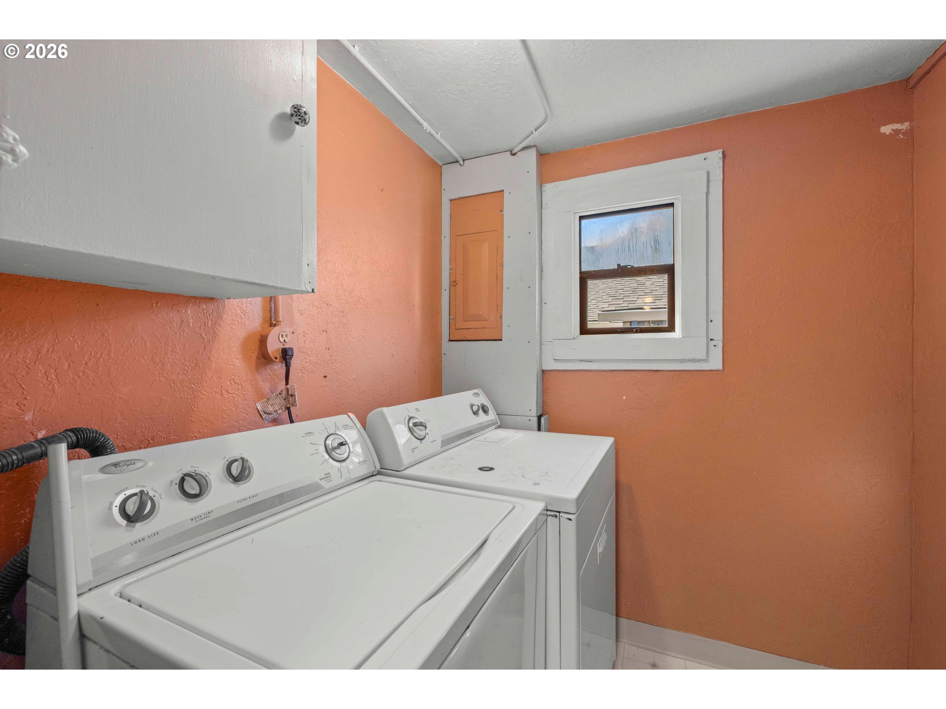 3909 Southeast 69th Avenue Portland, OR 97206 - Photo 12 of 15 a utility room with dryer and washer