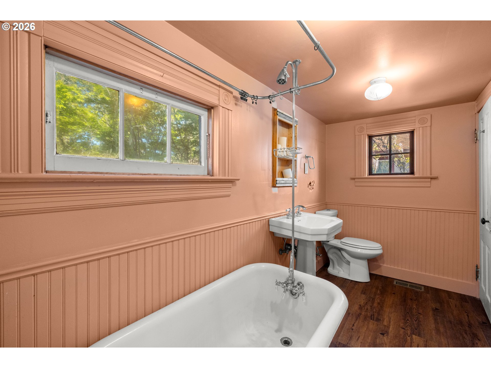 3909 Southeast 69th Avenue Portland, OR 97206 - Photo 9 of 15 a bathroom with a sink a toilet and a window