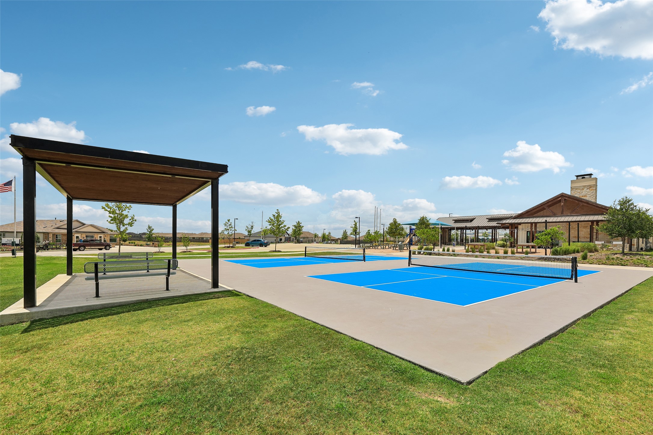 19805 Abigail Fillmore Road Manor, TX 78653 - Photo 29 of 40 Sport courts and a community pavilion await outdoor enthusiasts.