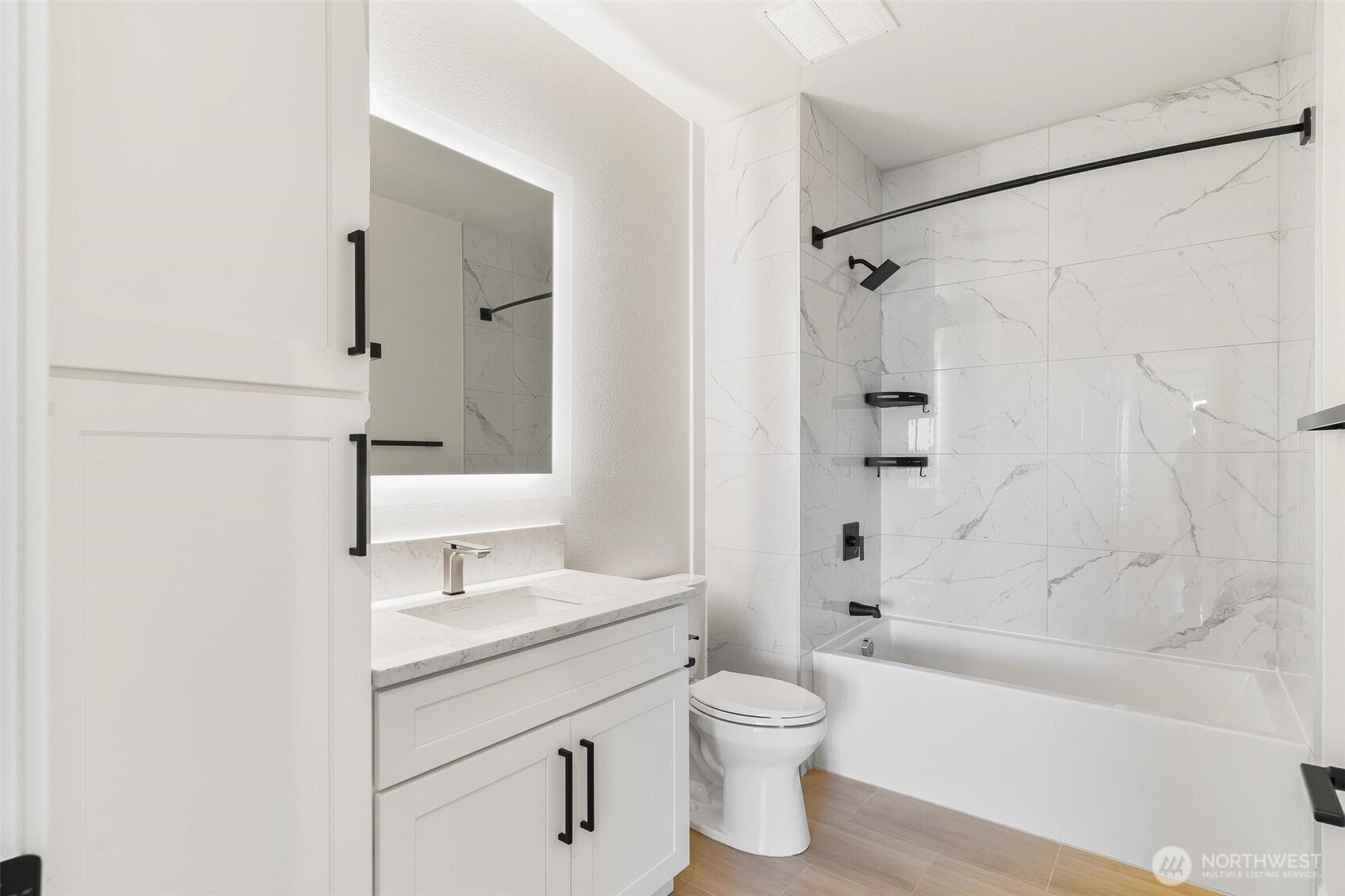 14915 38th Drive Southeast, Unit F3011 Bothell, WA 98012 - Photo 20 of 40 a bathroom with a sink toilet and shower