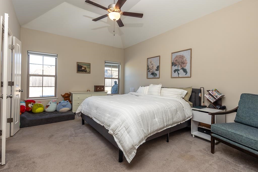 95 Chesnut Rdg Drive Oakland, TN 38060 - Photo 11 of 33 Bedroom with light colored carpet, lofted ceiling, and ceiling fan