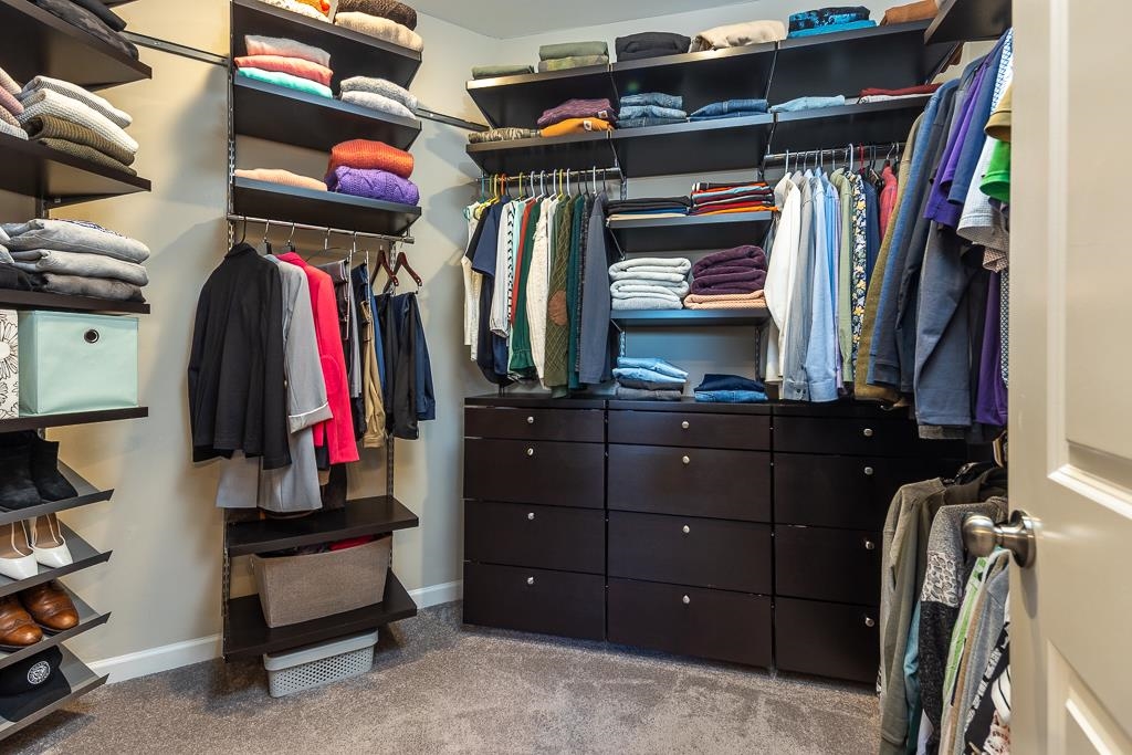 95 Chesnut Rdg Drive Oakland, TN 38060 - Photo 10 of 33 a view of walk in closet with clothes and shoes