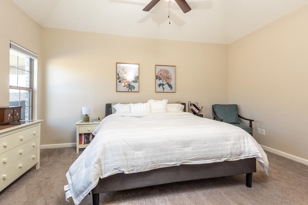 95 Chesnut Rdg Drive Oakland, TN 38060 - Photo 12 of 33 Bedroom with vaulted ceiling, carpet floors, and ceiling fan