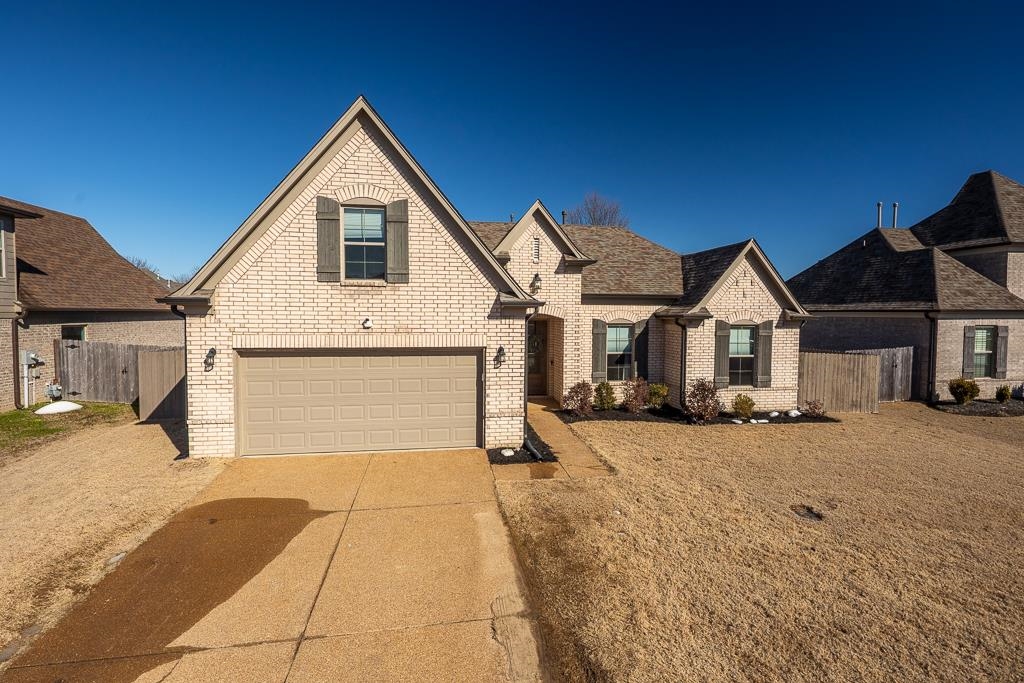 95 Chesnut Rdg Drive Oakland, TN 38060 - Photo 20 of 33 a front view of a house with a yard