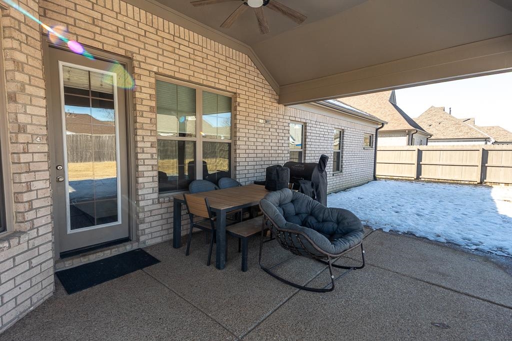 95 Chesnut Rdg Drive Oakland, TN 38060 - Photo 24 of 33 View of patio with outdoor dining area and ceiling fan