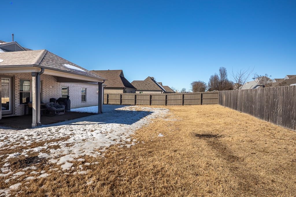 95 Chesnut Rdg Drive Oakland, TN 38060 - Photo 26 of 33 Fenced backyard featuring a patio