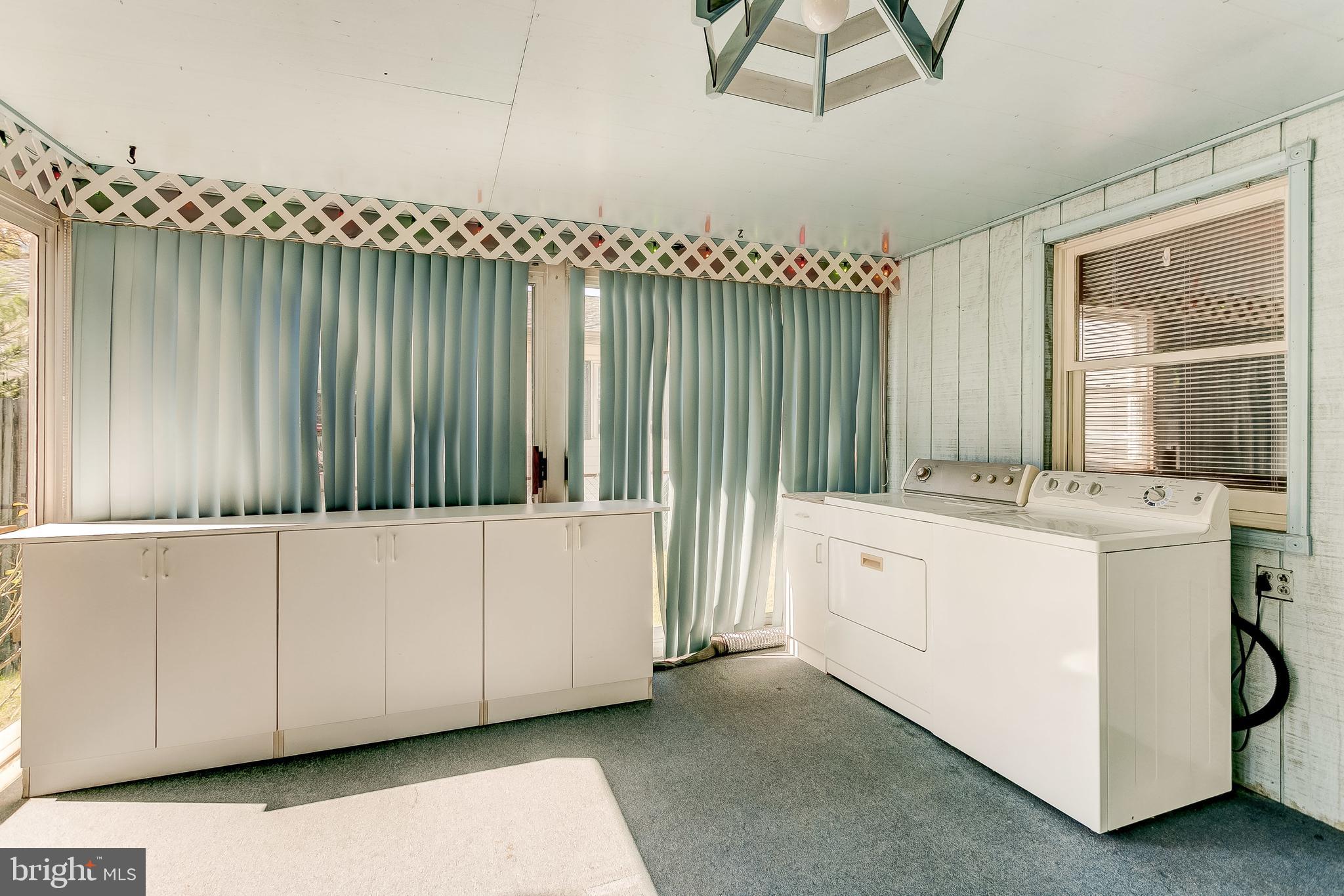 1508 Wilson Point Road Baltimore, MD 21220 - Photo 25 of 43 Enclosed Porch has Washer & Dryer