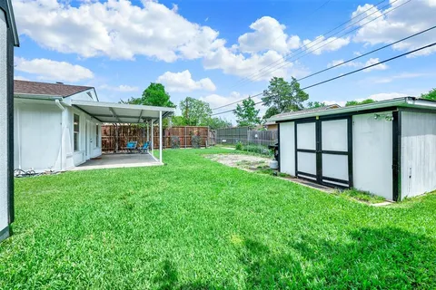 a view of a porch with a yard