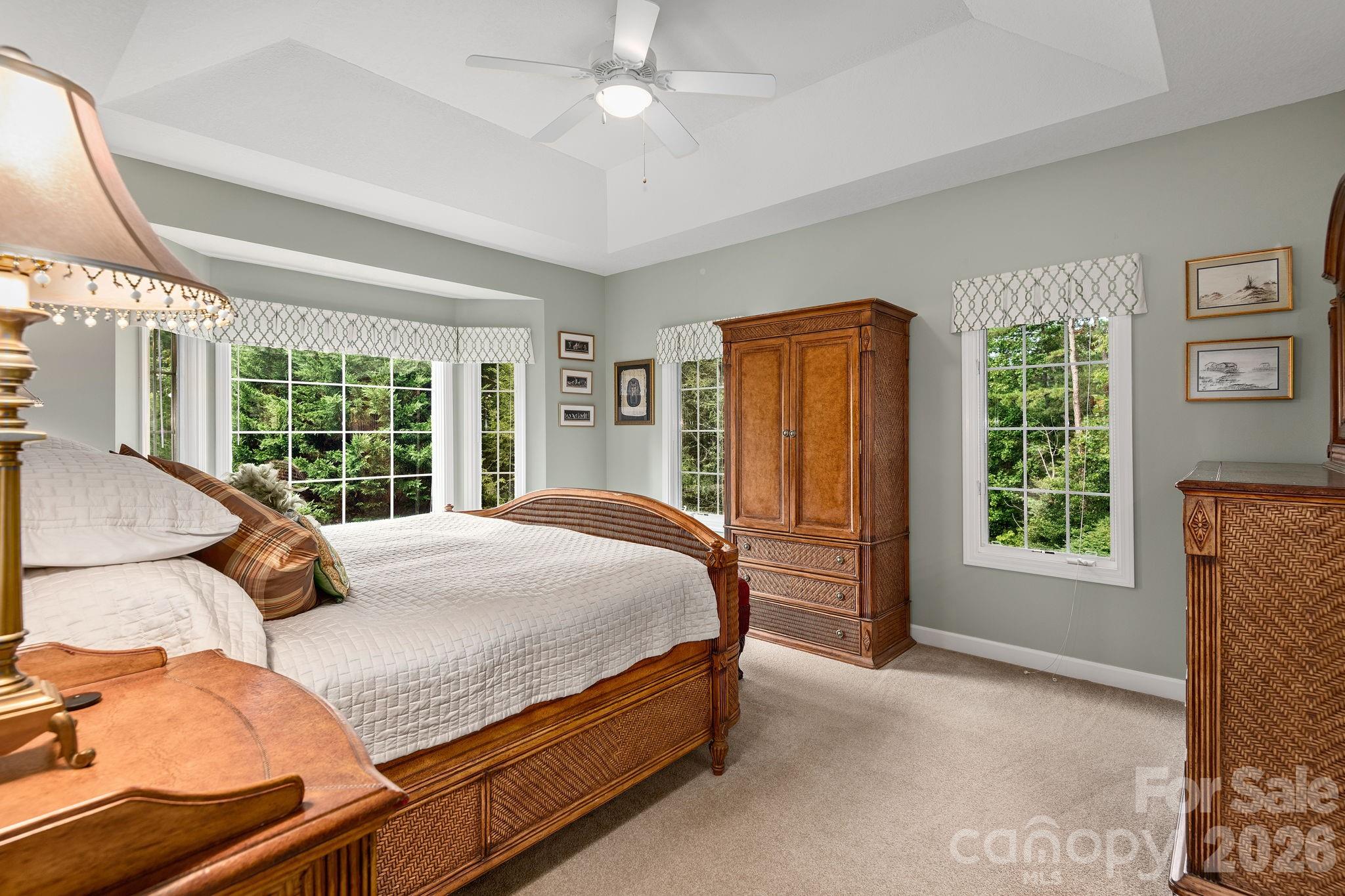 212 Blue Ridge Vista Asheville, NC 28805 - Photo 19 of 42 a bedroom with a bed and a large window