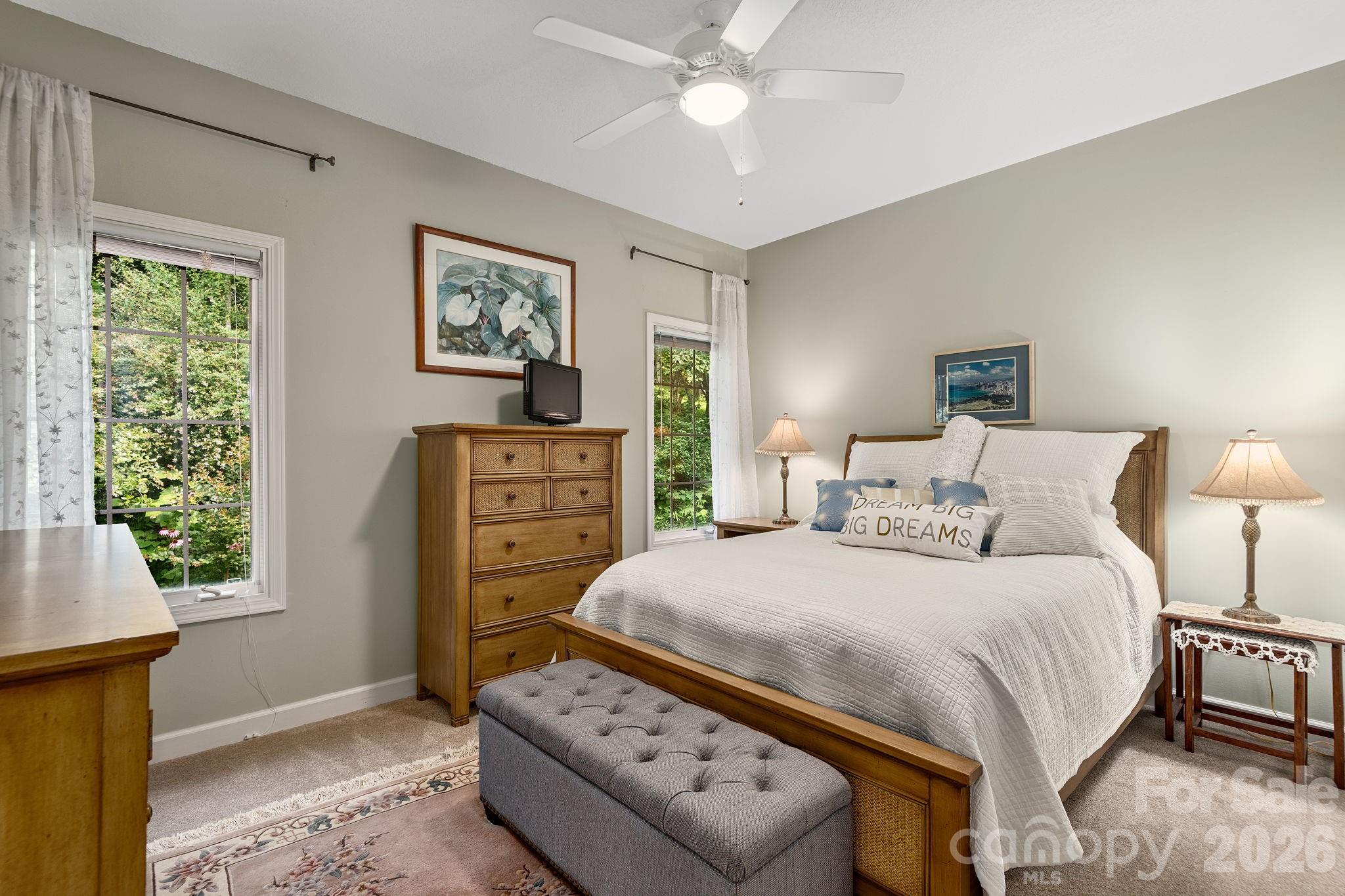 212 Blue Ridge Vista Asheville, NC 28805 - Photo 28 of 42 a bedroom with a bed and a window