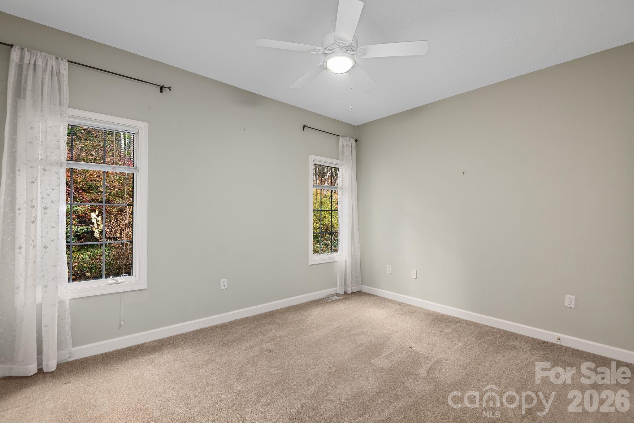 212 Blue Ridge Vista Asheville, NC 28805 - Photo 29 of 42 an empty room with a window