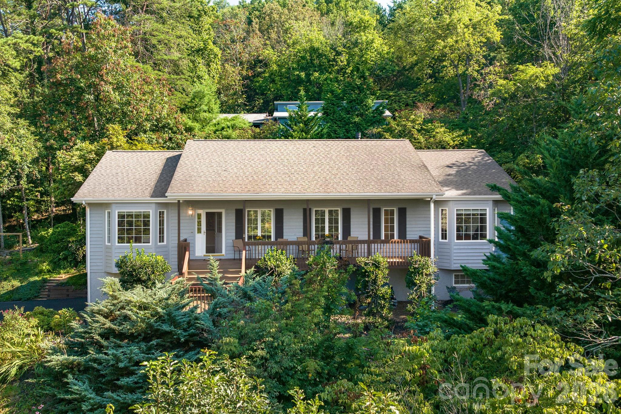 212 Blue Ridge Vista Asheville, NC 28805 - Photo 33 of 42 front view of a house with a yard