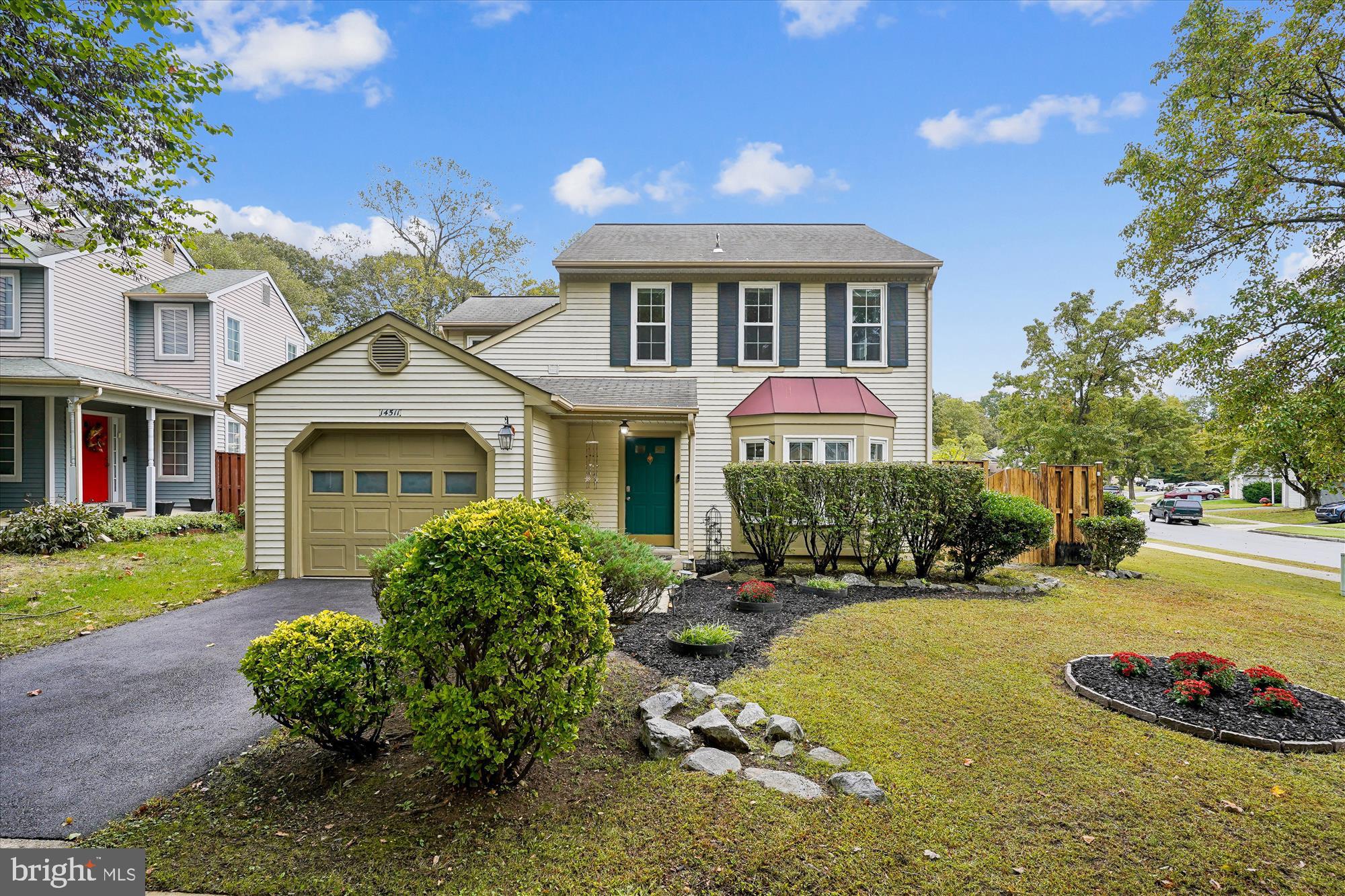 14511 Colonels Choice Road Upper Marlboro, MD 20772 - Photo 1 of 41 a front view of a house with a yard