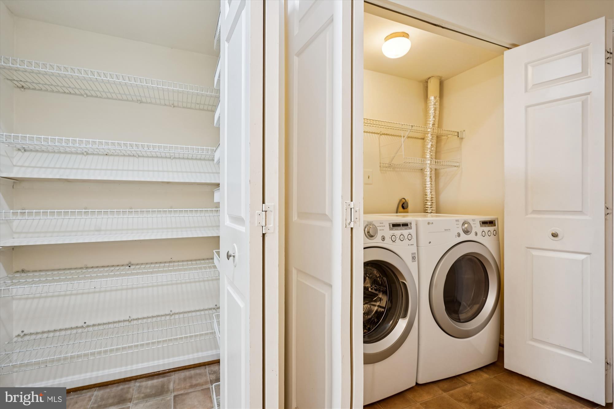 14511 Colonels Choice Road Upper Marlboro, MD 20772 - Photo 16 of 41 a utility room with dryer and washer