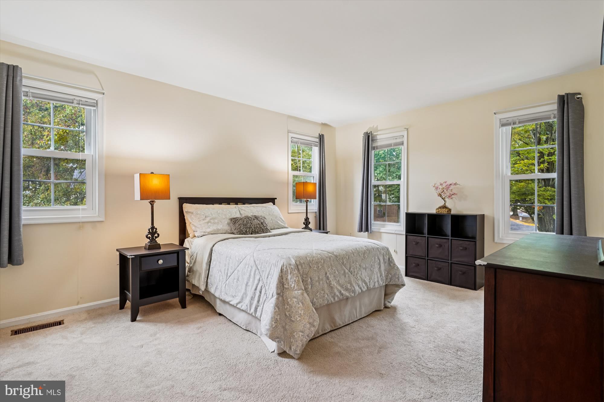 14511 Colonels Choice Road Upper Marlboro, MD 20772 - Photo 18 of 41 a bedroom with a bed lamps and window