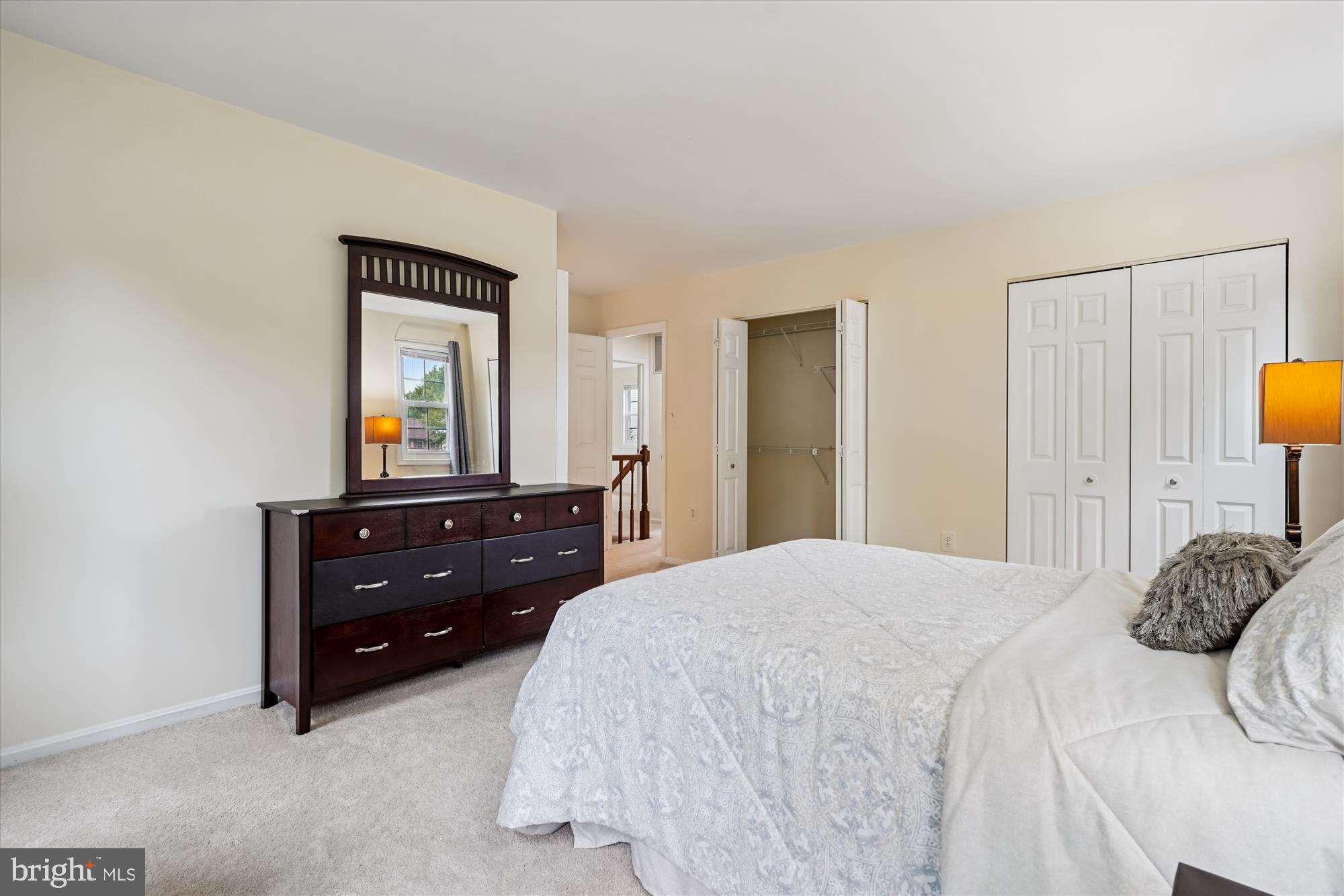 14511 Colonels Choice Road Upper Marlboro, MD 20772 - Photo 20 of 41 a bedroom with a bed and a mirror