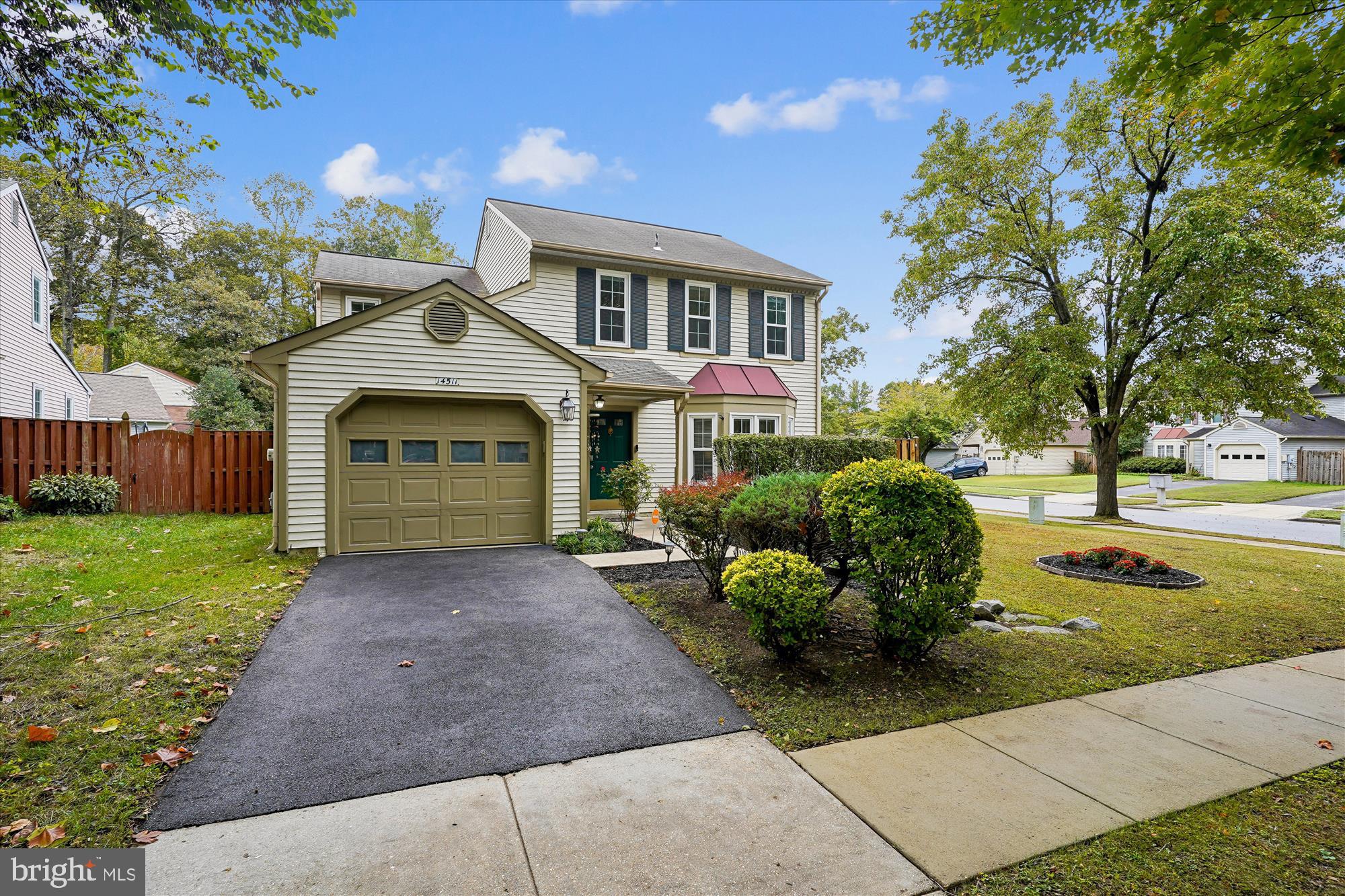 14511 Colonels Choice Road Upper Marlboro, MD 20772 - Photo 2 of 41 a front view of a house with a yard