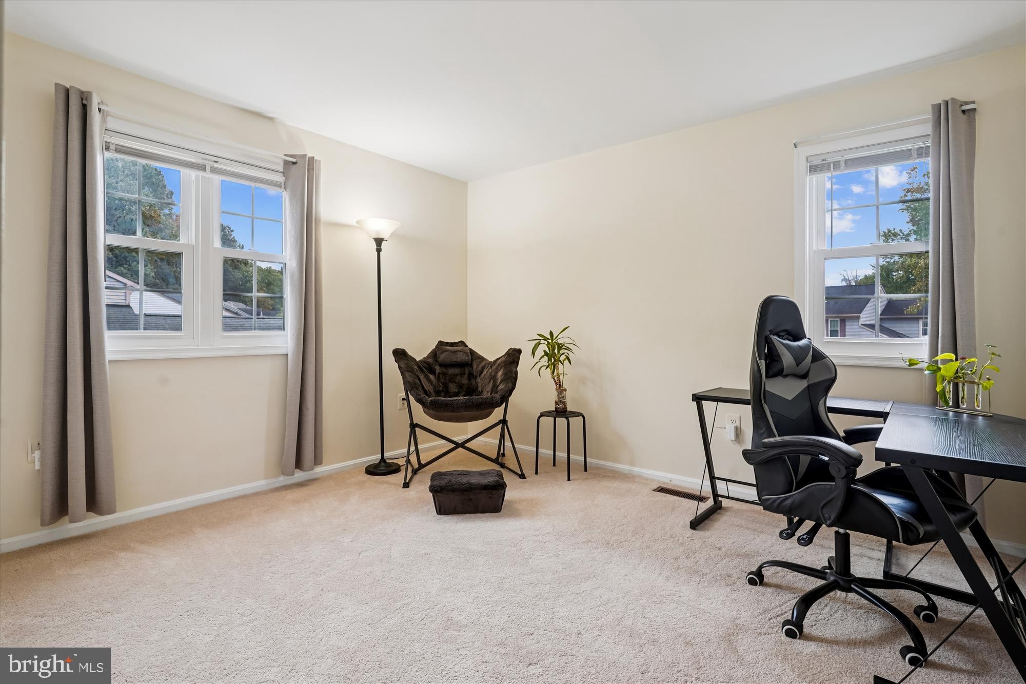 14511 Colonels Choice Road Upper Marlboro, MD 20772 - Photo 27 of 41 a view of a workspace with furniture and a window