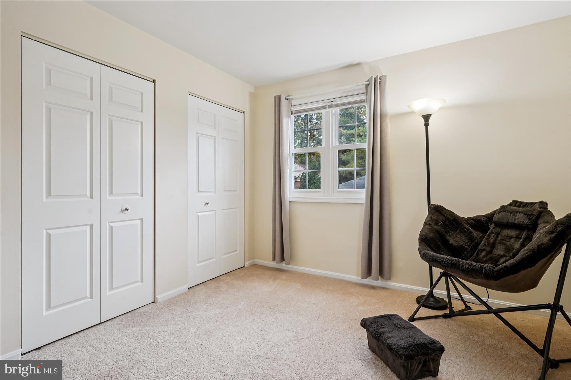 14511 Colonels Choice Road Upper Marlboro, MD 20772 - Photo 28 of 41 a living room with furniture and a window