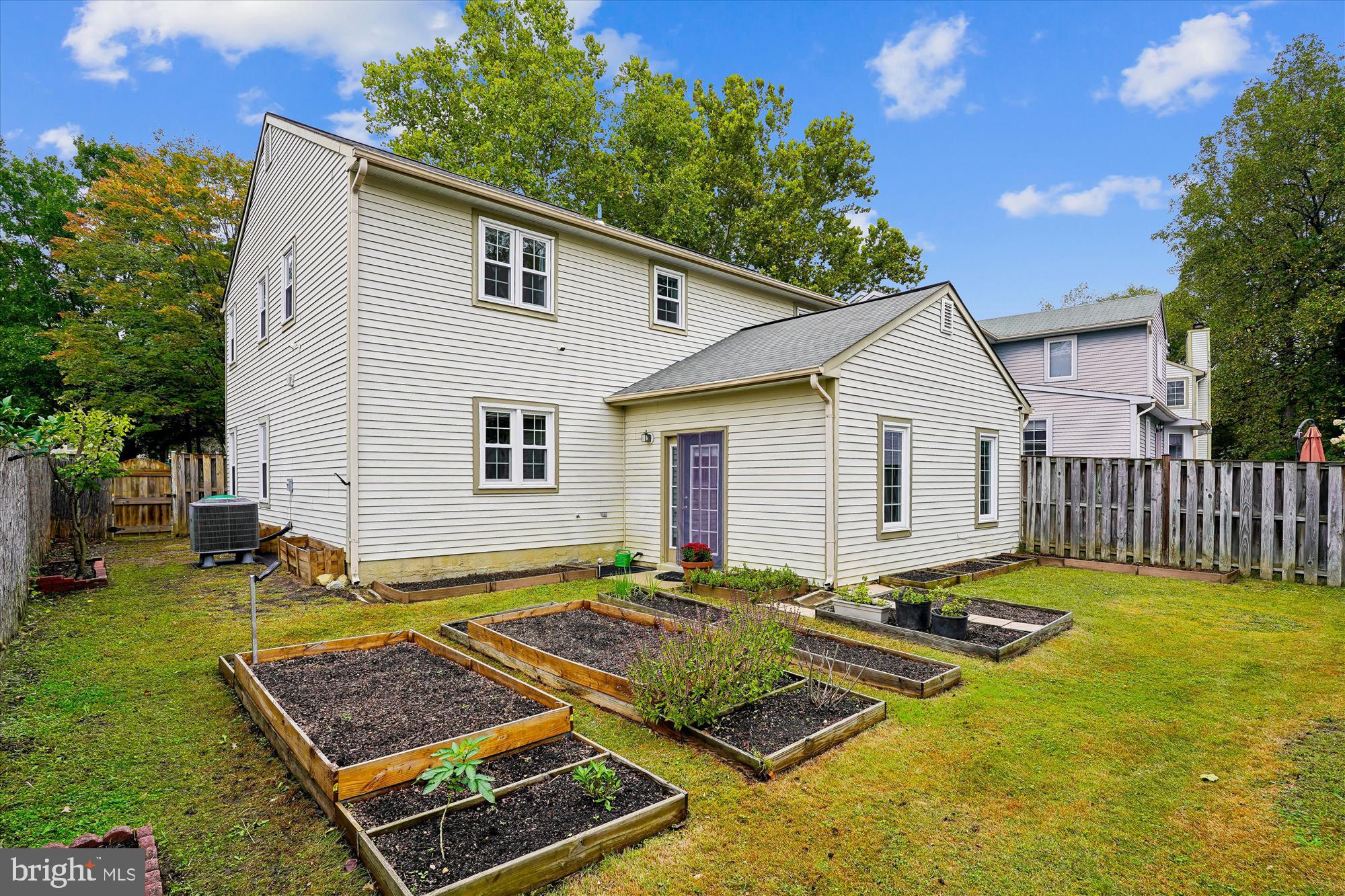 14511 Colonels Choice Road Upper Marlboro, MD 20772 - Photo 29 of 41 a front view of a house with garden