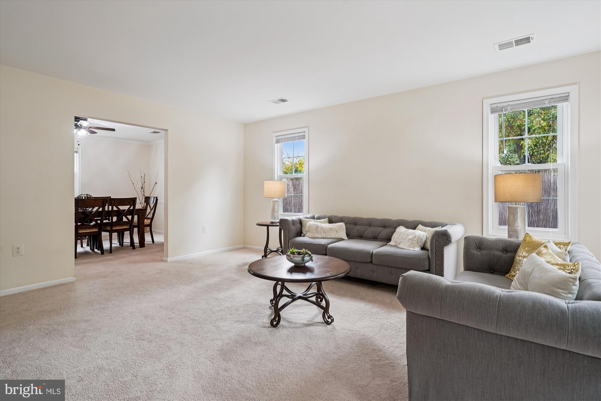 14511 Colonels Choice Road Upper Marlboro, MD 20772 - Photo 8 of 41 a living room with furniture and a window
