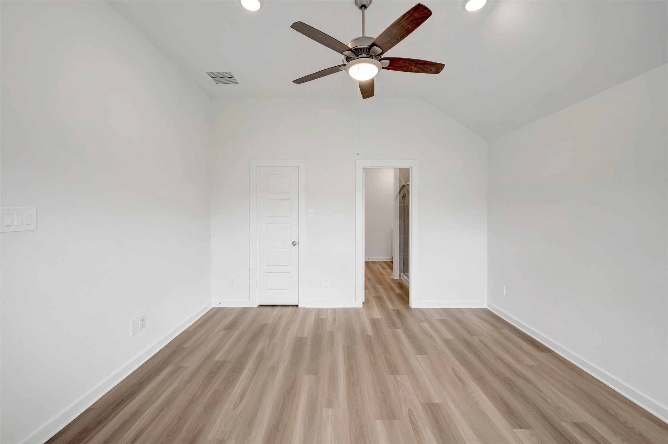 543 Flower Reed Court Magnolia, TX 77354 - Photo 35 of 46 an empty room with wooden floor and a ceiling fan