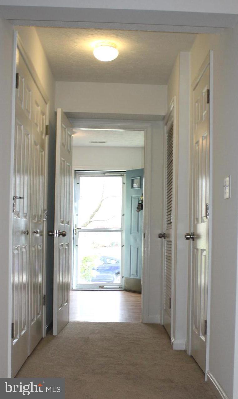 2104 Colonel Way Odenton, MD 21113 - Photo 2 of 27 Main level hall from family room to front door.