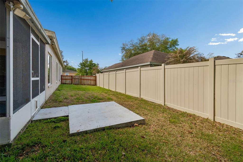 5311 Watson Road Riverview, FL 33578 - Photo 30 of 33 a view of backyard with cabin