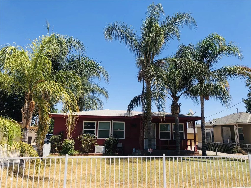8425 Philbin Avenue Riverside, CA 92503 - Photo 1 of 1 a front view of a house with a garden