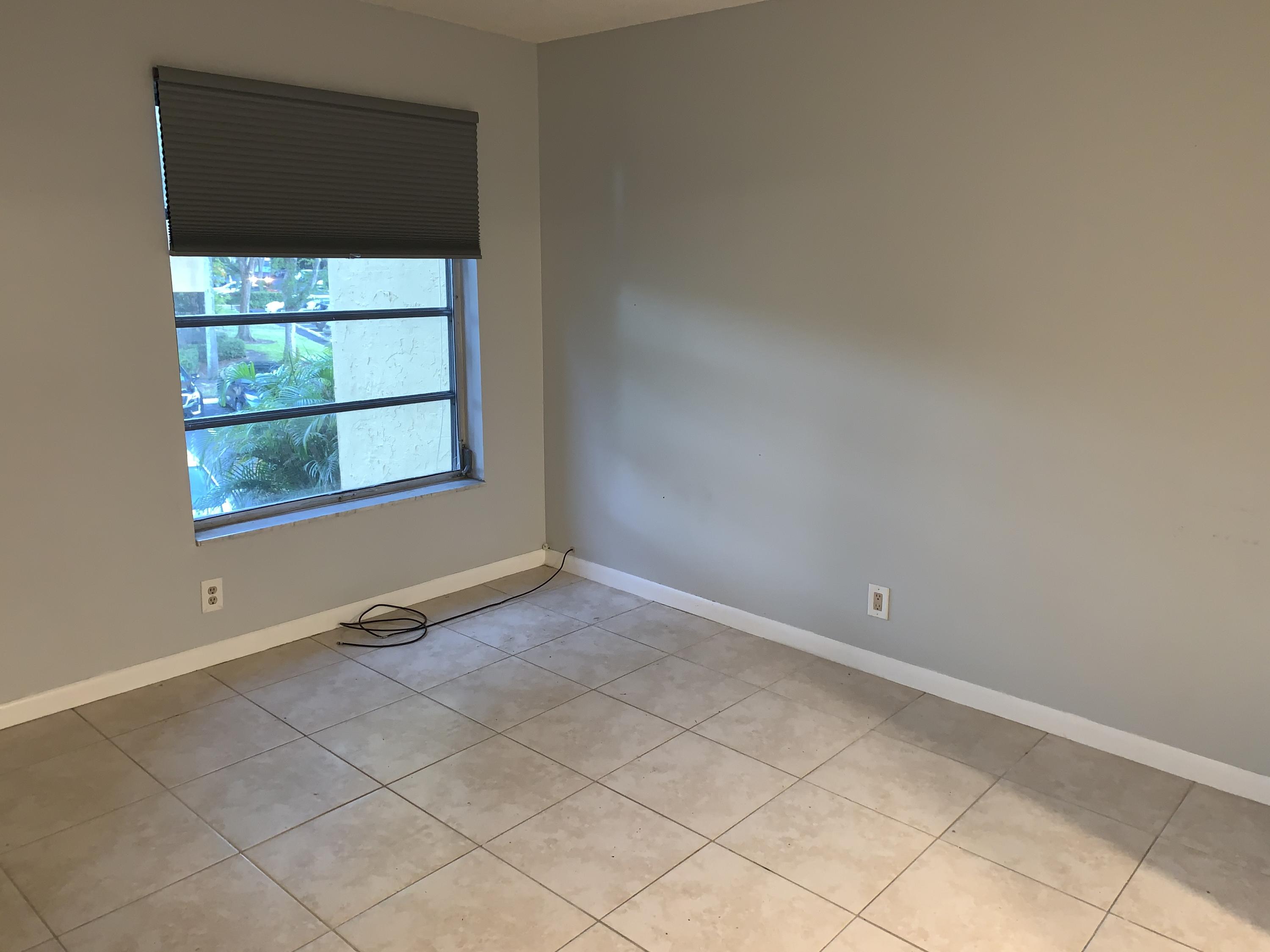450 Northwest 20th Street, Unit 209 Boca Raton, FL 33431 - Photo 11 of 28 Guest Bedroom