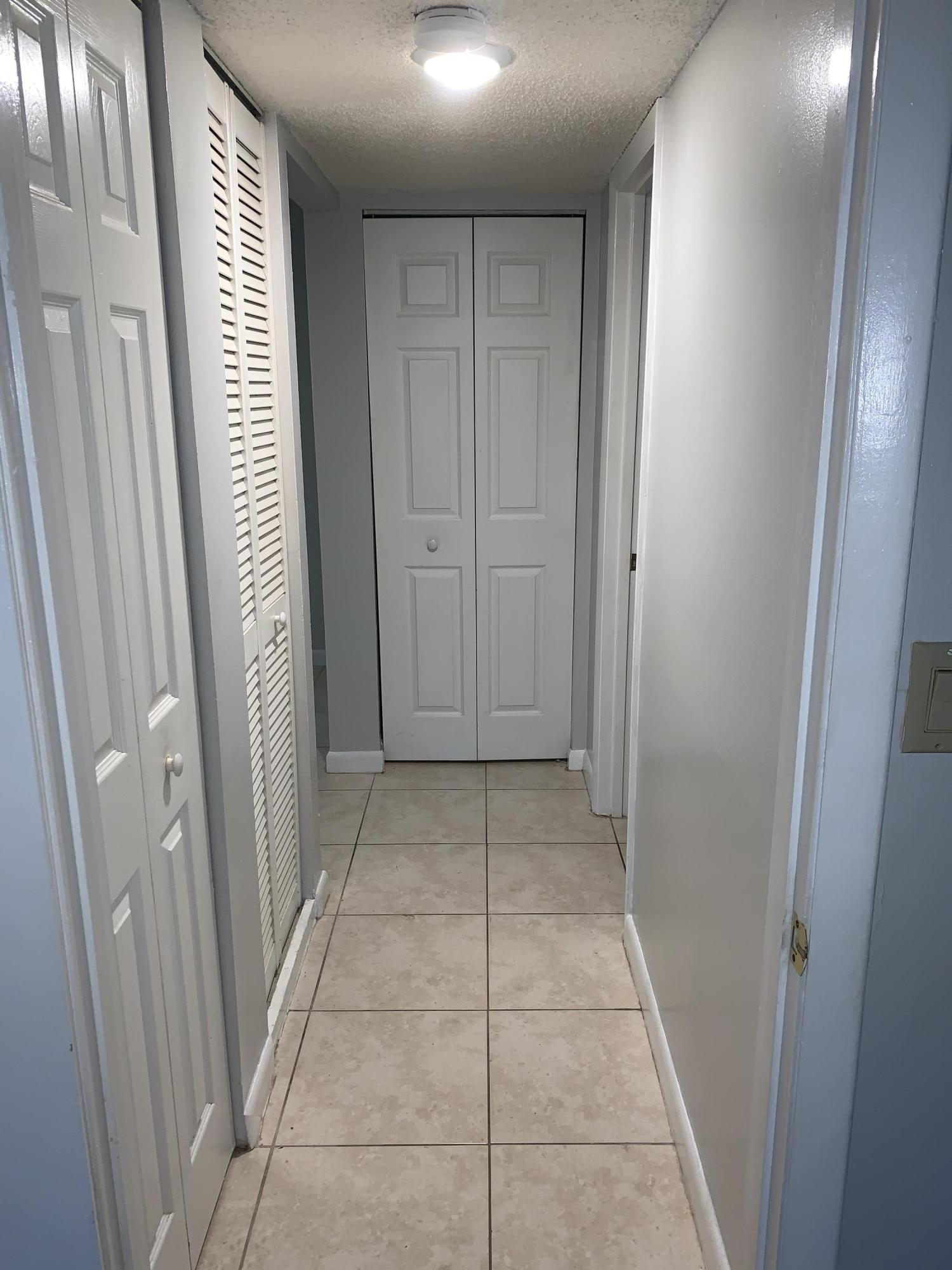 450 Northwest 20th Street, Unit 209 Boca Raton, FL 33431 - Photo 15 of 28 Hallway
