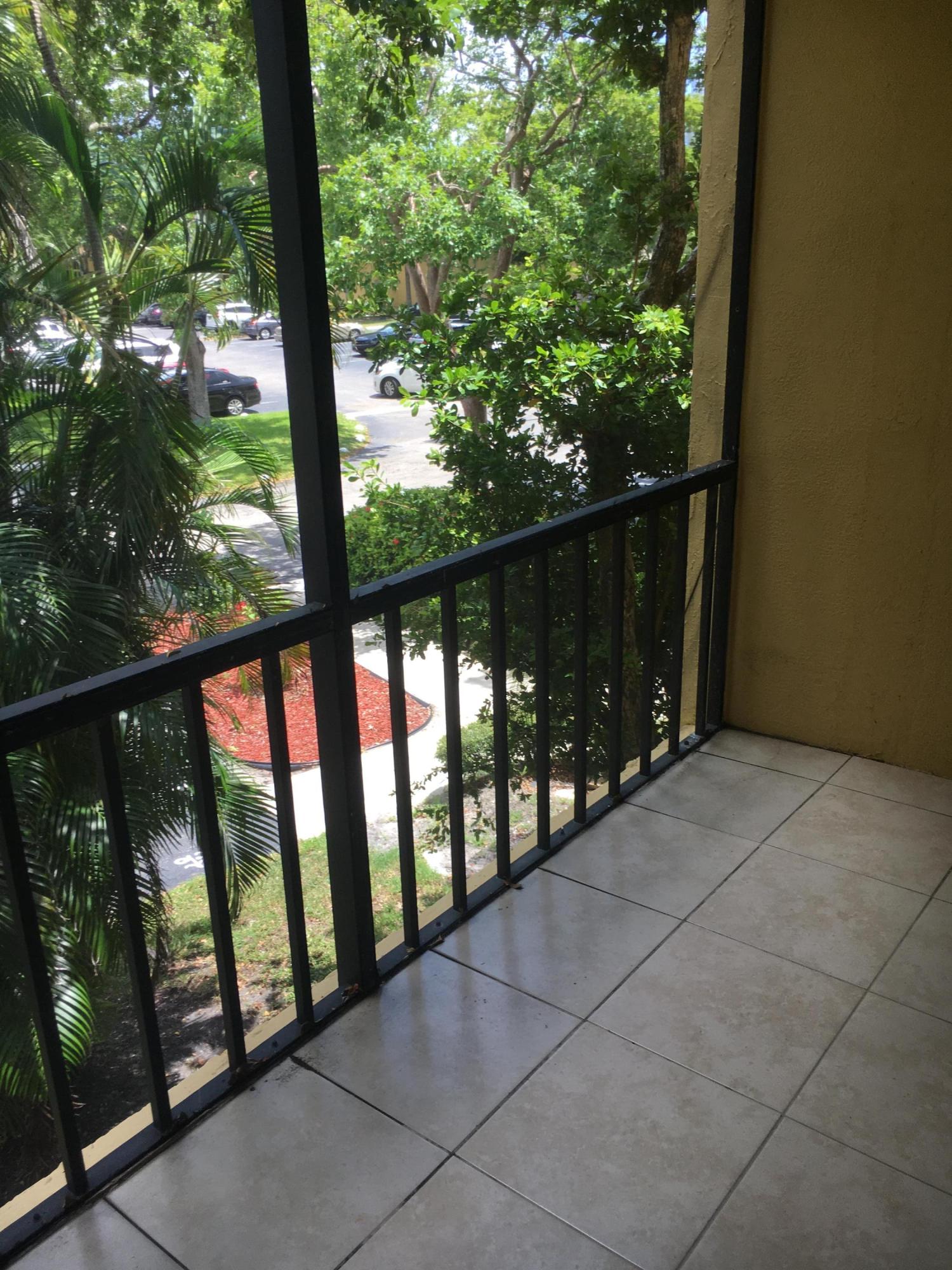 450 Northwest 20th Street, Unit 209 Boca Raton, FL 33431 - Photo 16 of 28 Screened balcony