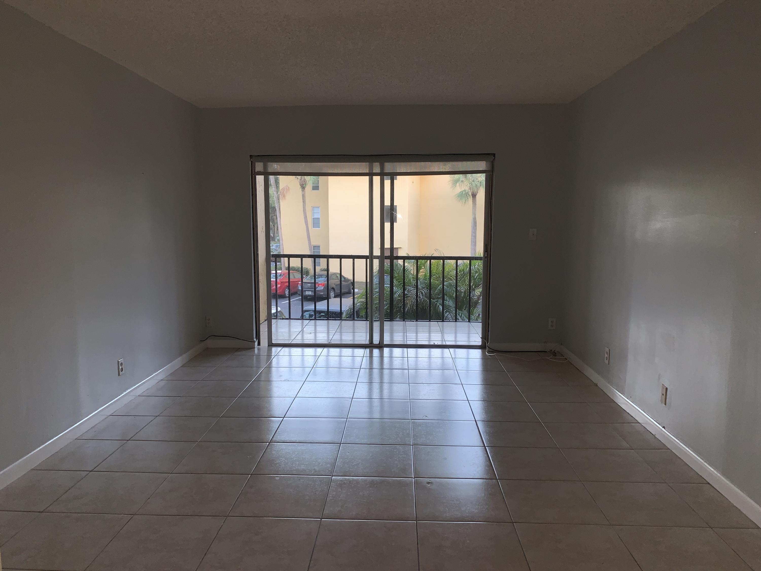 450 Northwest 20th Street, Unit 209 Boca Raton, FL 33431 - Photo 9 of 28 Living Room