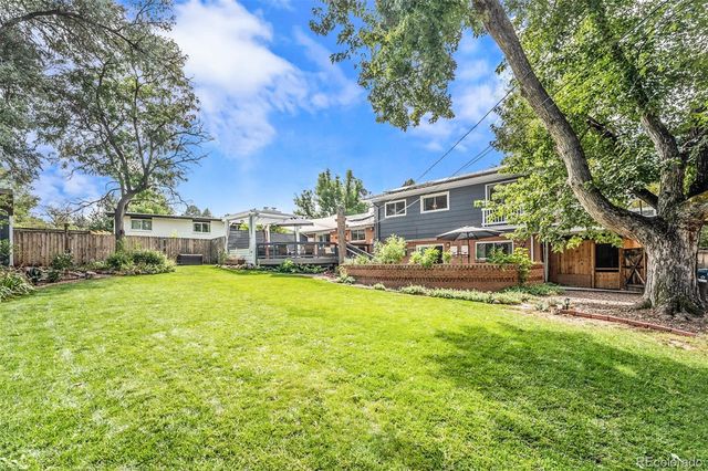 a front view of house with yard and seating area