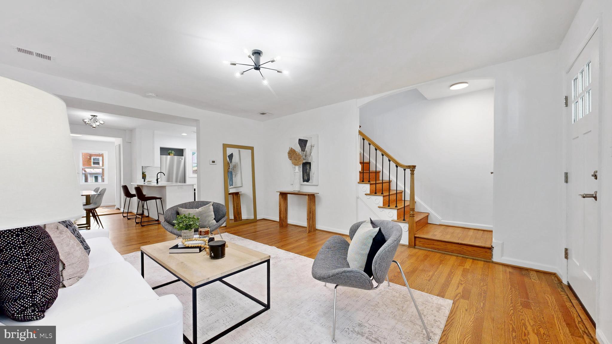 48 Girard Street Northeast Washington, DC 20002 - Photo 1 of 43 a living room with furniture