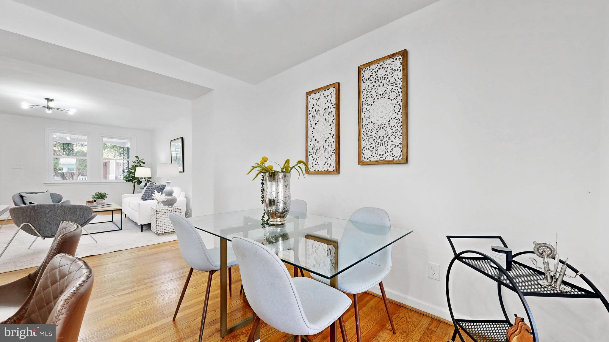48 Girard Street Northeast Washington, DC 20002 - Photo 16 of 43 a view of a dining room with furniture window and wooden floor
