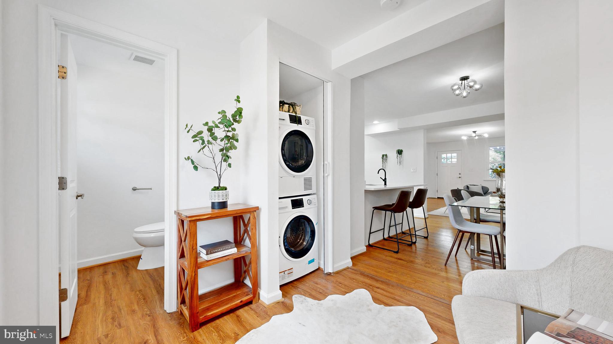 48 Girard Street Northeast Washington, DC 20002 - Photo 3 of 43 view of living room with washer and dryer