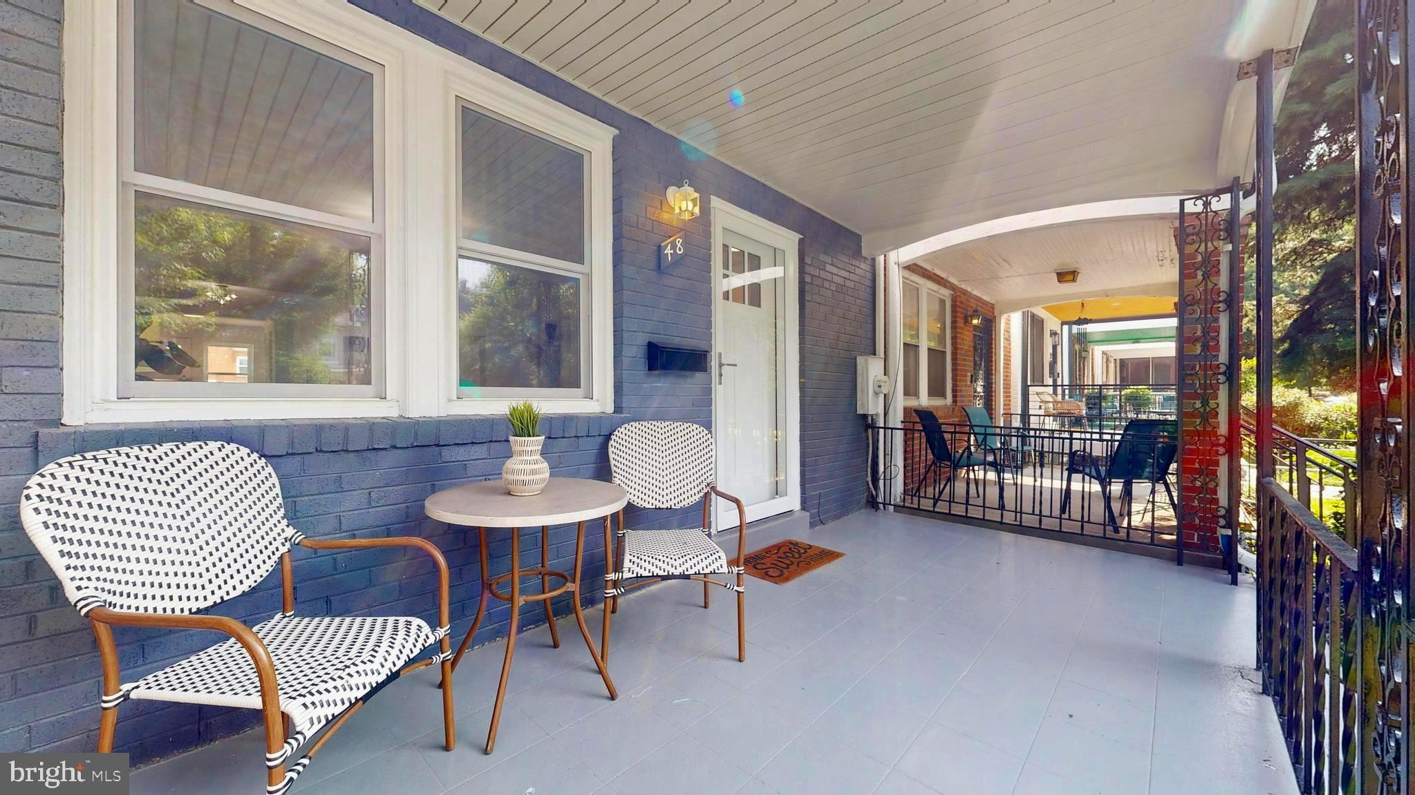 48 Girard Street Northeast Washington, DC 20002 - Photo 37 of 43 a view of a livingroom with furniture and a large window