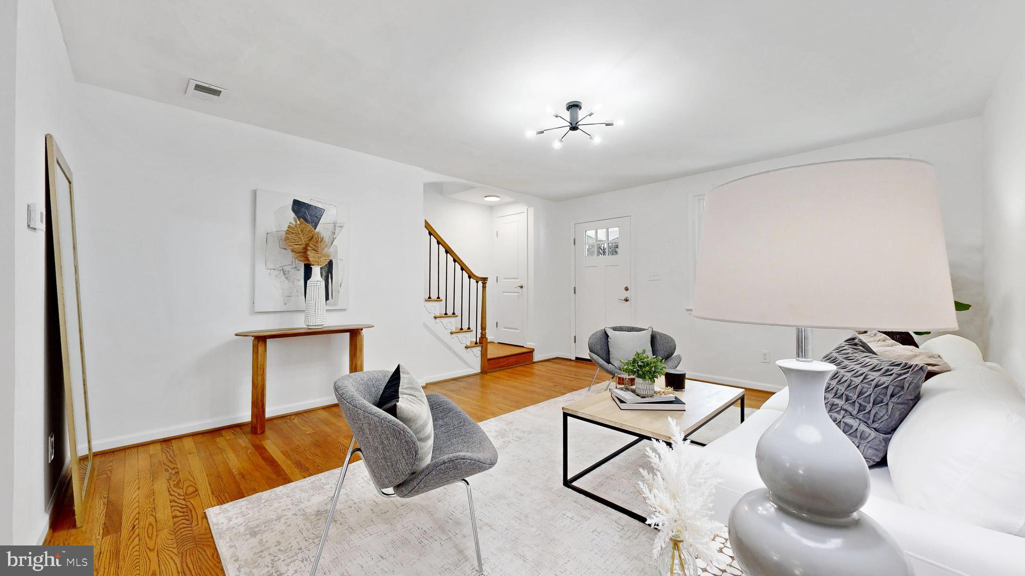 48 Girard Street Northeast Washington, DC 20002 - Photo 9 of 43 a living room with furniture