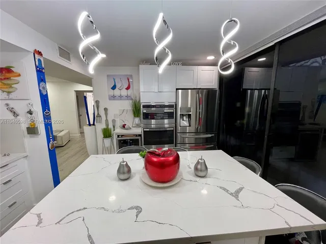 a view of a dining room with furniture