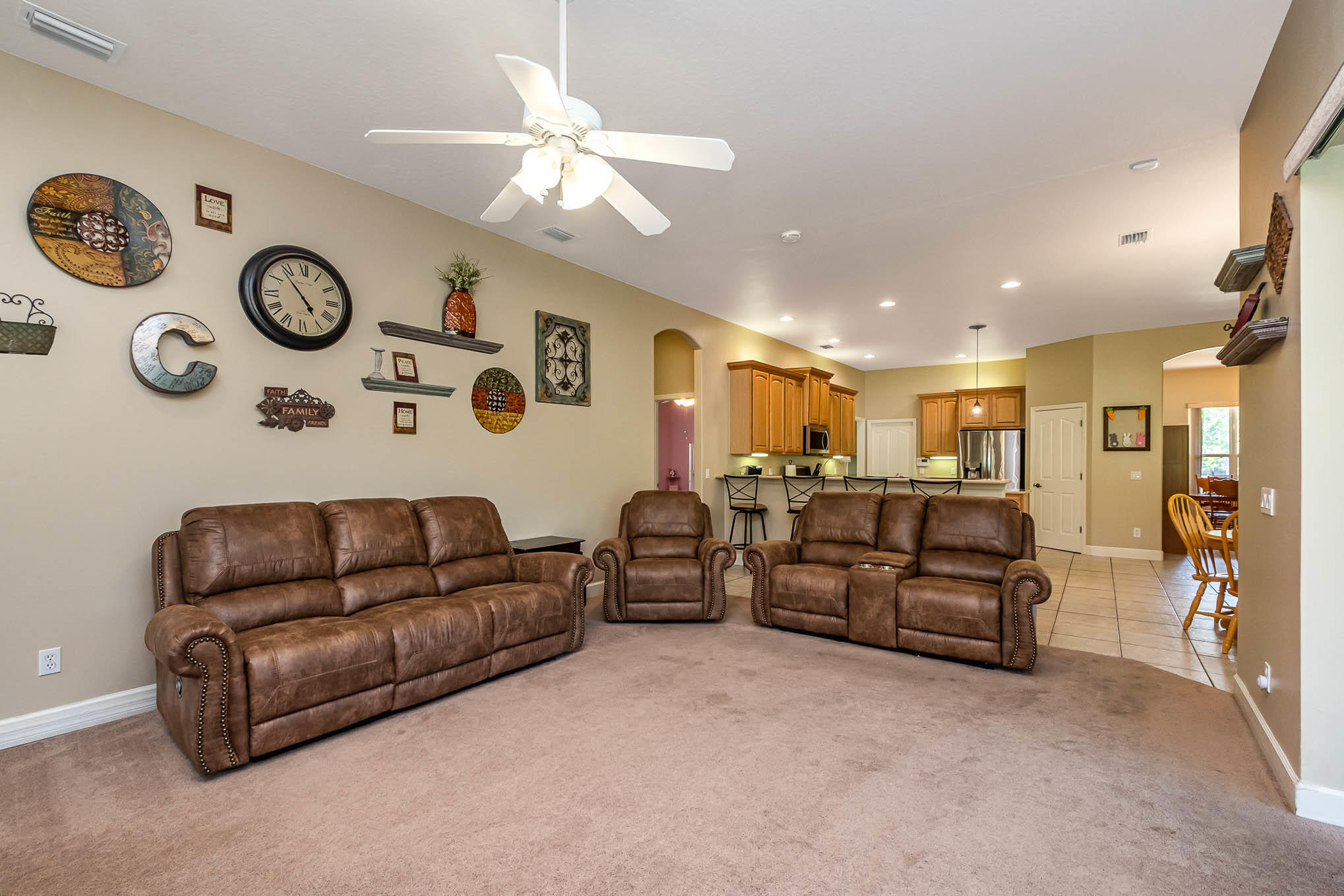 4329 Hunter Road Mims, FL 32754 - Photo 16 of 35 a living room with furniture and a large mirror