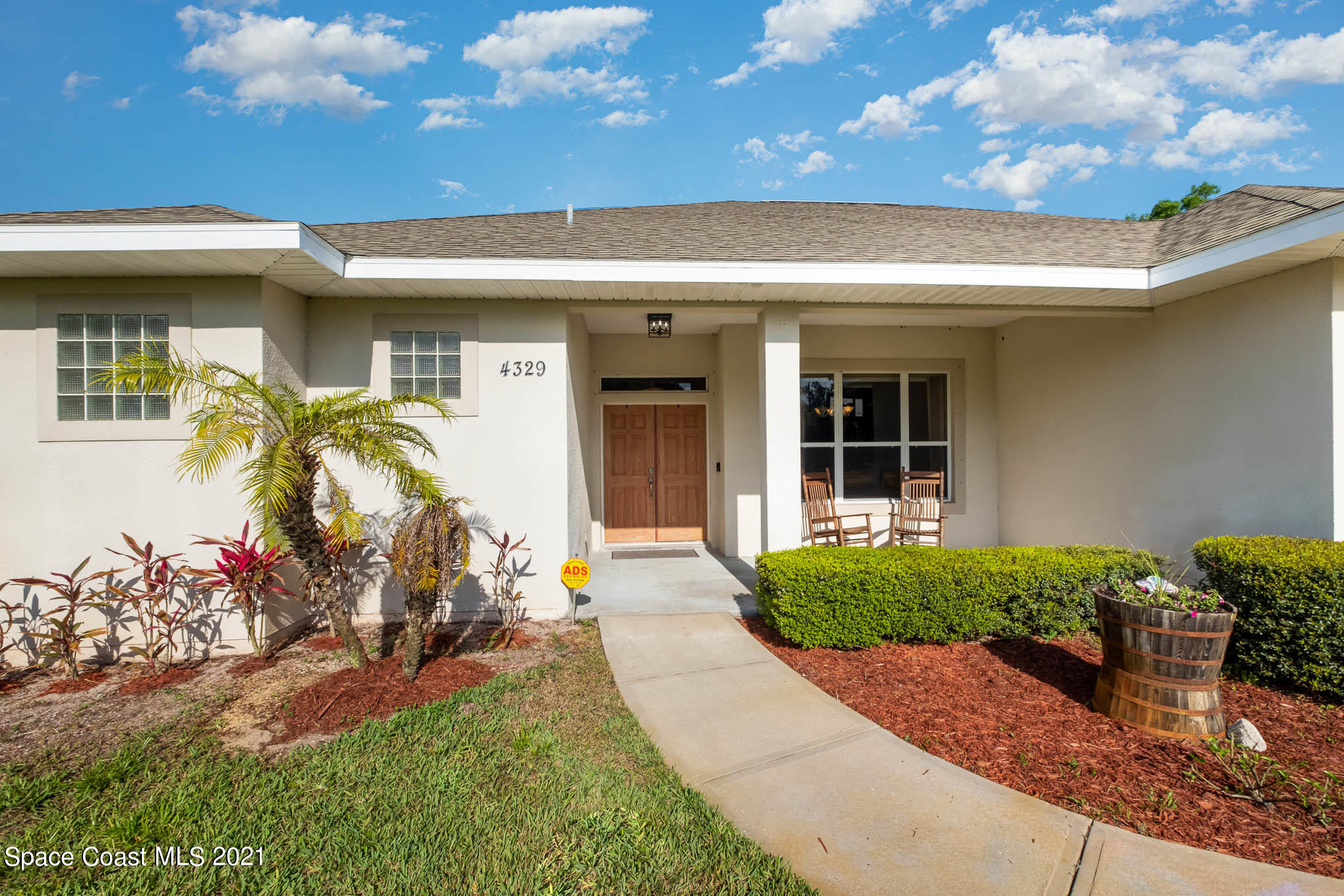 4329 Hunter Road Mims, FL 32754 - Photo 2 of 35 a front view of a house