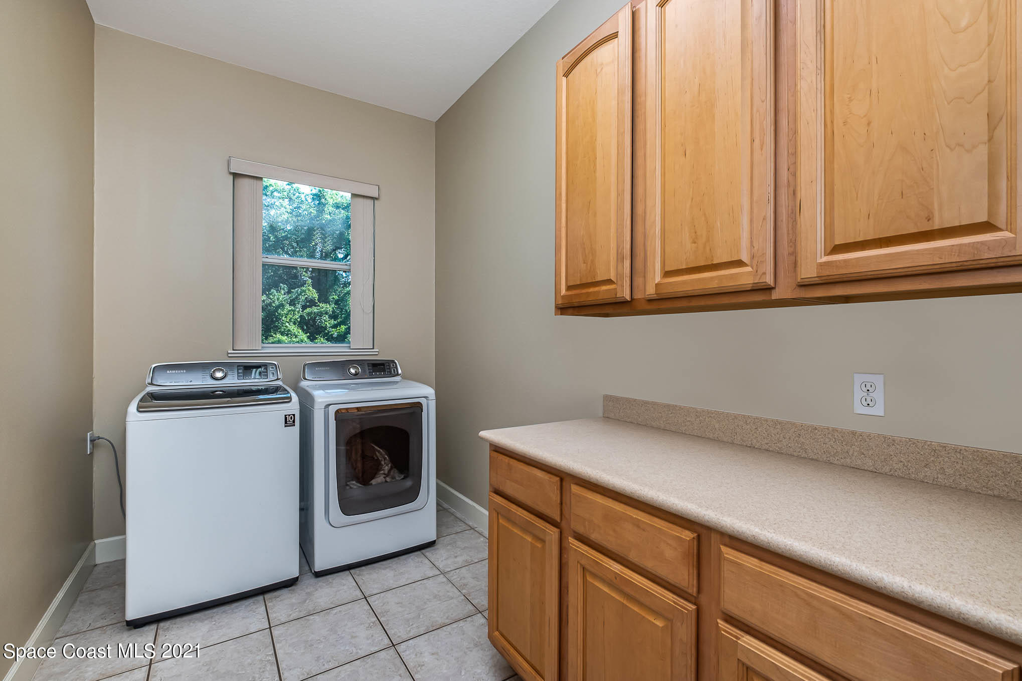 4329 Hunter Road Mims, FL 32754 - Photo 29 of 35 a utility room with dryer and washer