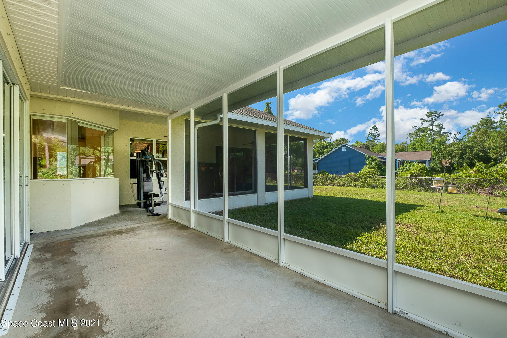 4329 Hunter Road Mims, FL 32754 - Photo 30 of 35 a view of an empty room with a garden