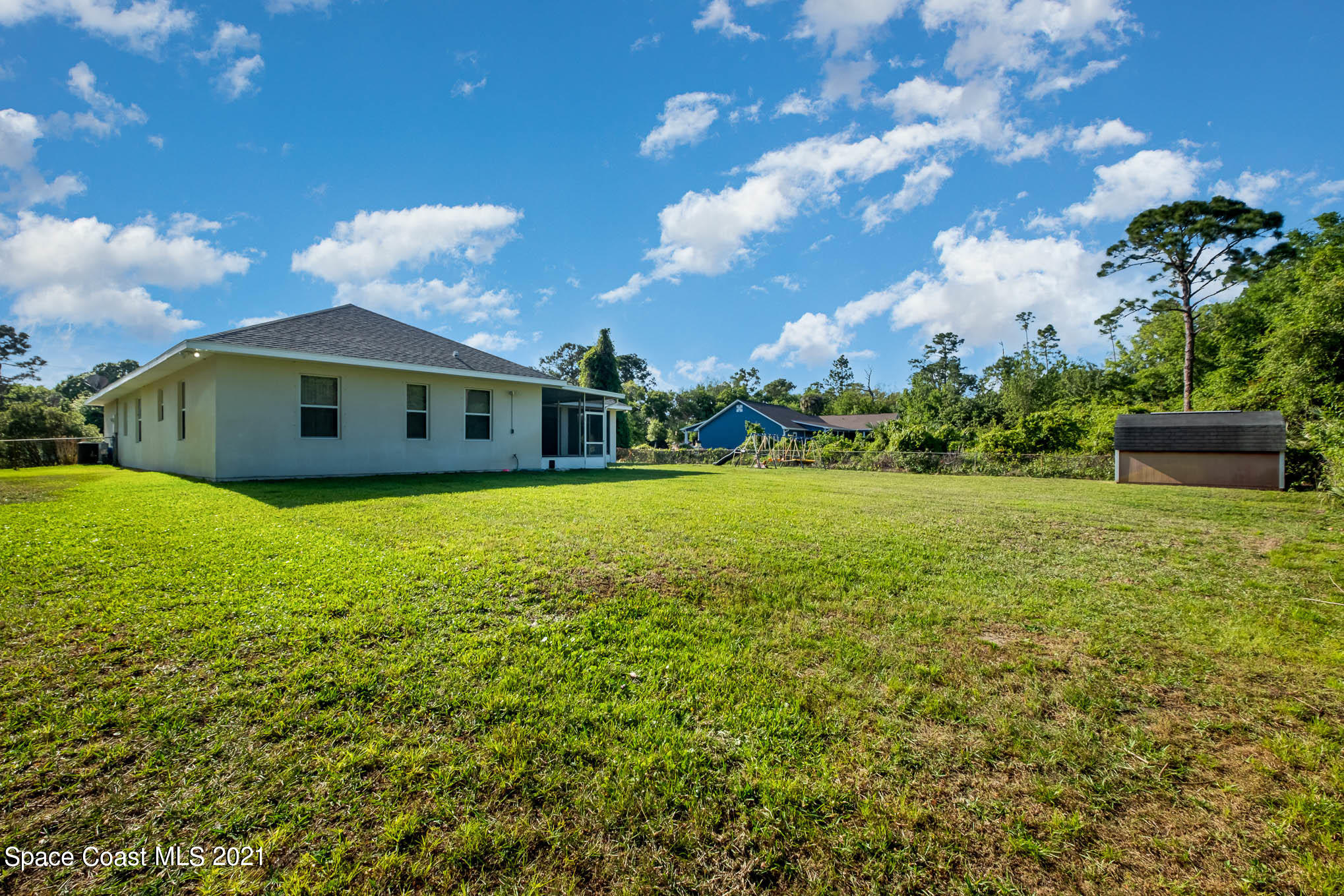 4329 Hunter Road Mims, FL 32754 - Photo 35 of 35 a view of a house with a yard